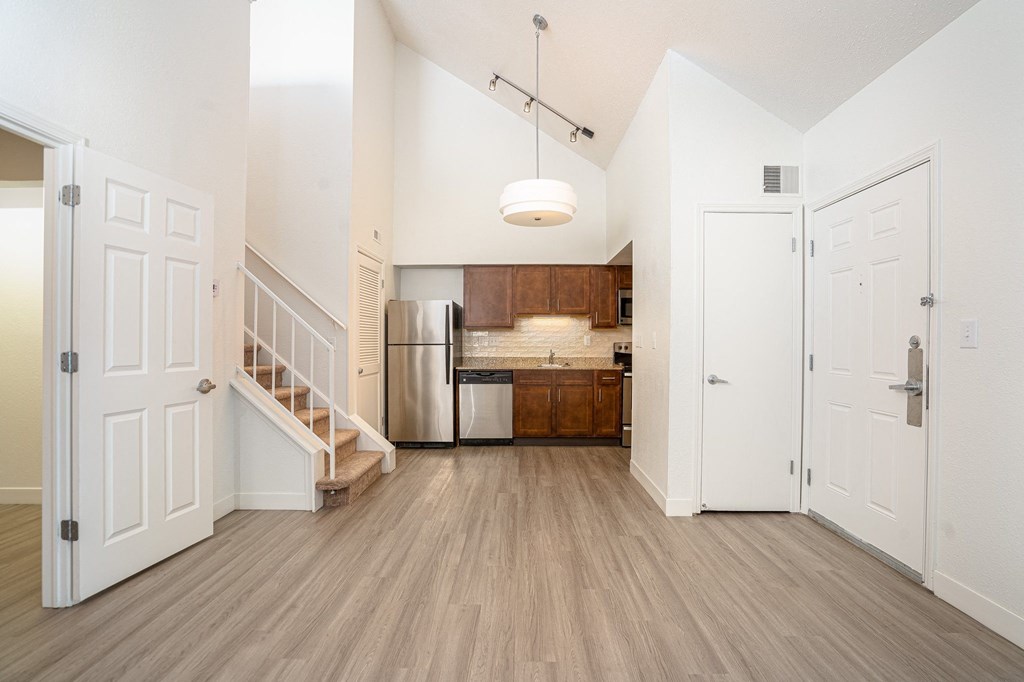a kitchen and dining area in a 555 waverly unit